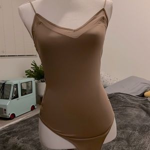 White and nude tops . Good condition